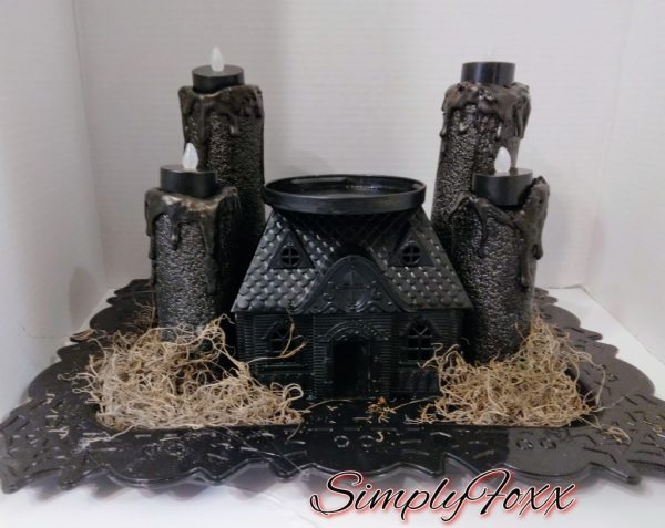 Halloween haunted house candle holder display