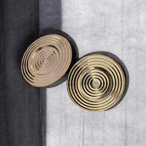 Ribbed coil gold tone stud earrings